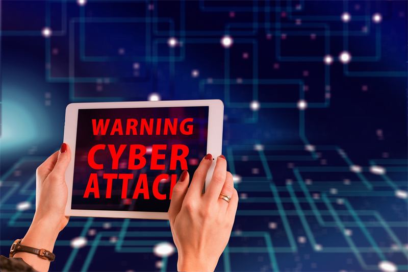 Tablet showing a cyber attack warning